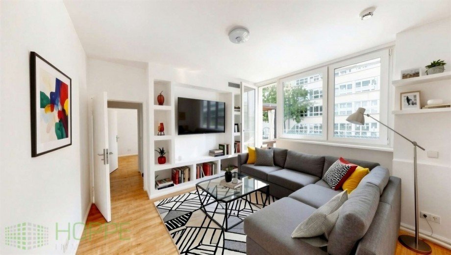 Wohnzimmer Perspektive 1 - (Einrichtungsbeispiel KI generiert) Etagenwohnung Berlin