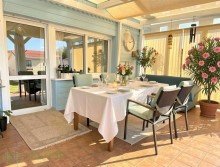 Terrasse Perspektive 1 - (KI generiert) Bungalow in Altglienicke kurzfristig beziehbar - Komfortables Wohnen auf einer Ebene!